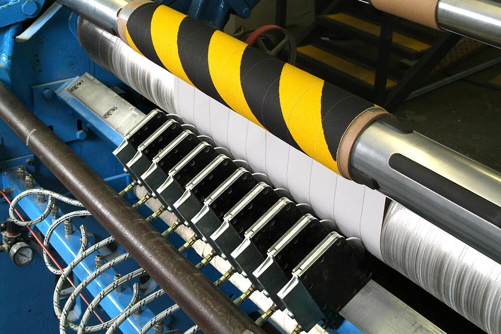 Black and Yellow Hazard Anti-Slip Material being Crush Cut into Rolls 2