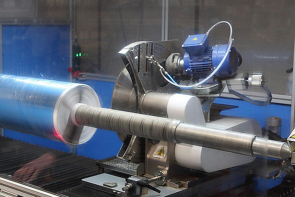 Cevenini Log Tape Slitter in Action Cutting Blue Line Marking Tape Tape