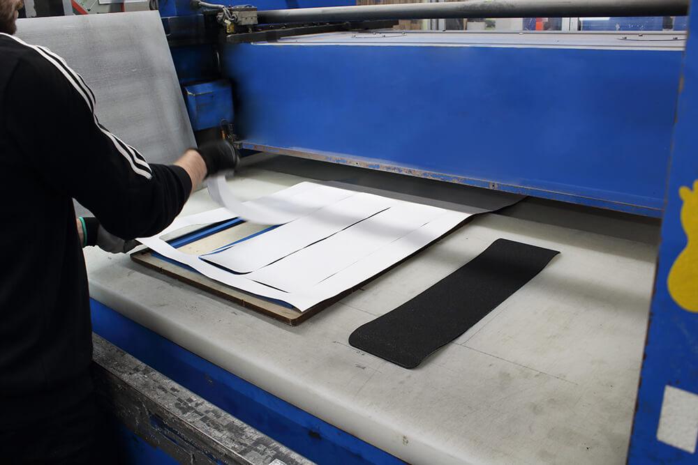 Die Cutting Machine Cutting Black Non Slip Tape into Rectangles 2