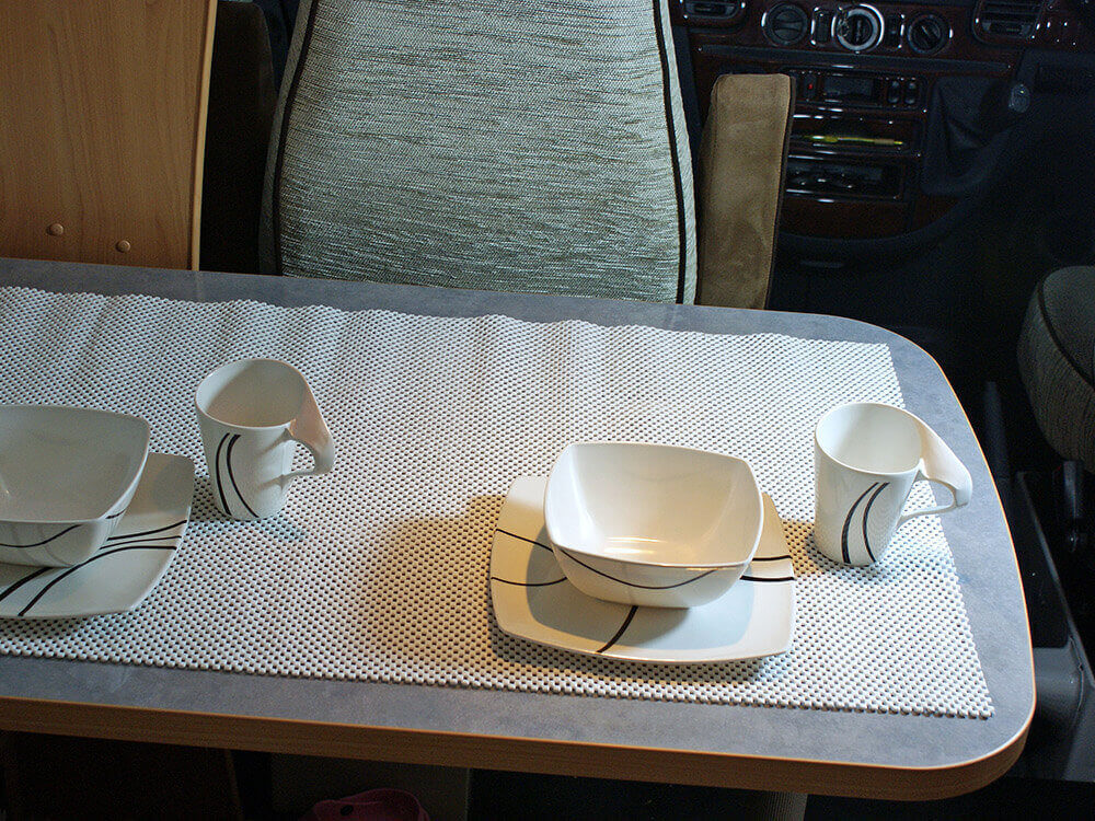 Non-slip fabric materials for grip on shelves drawers shoes boats