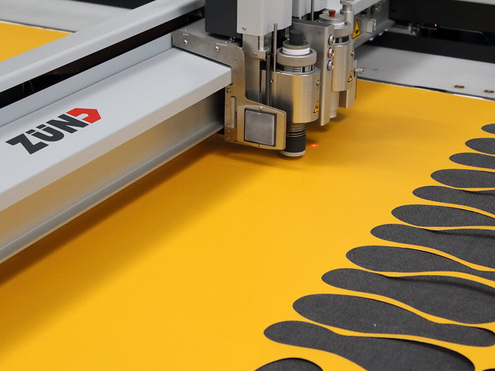 Zund Digital Die Cutting Machine Cutting Yellow Non Slip Material into Shoe Shapes 7